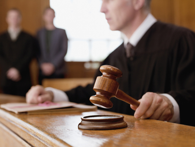 Judge hitting gavel
