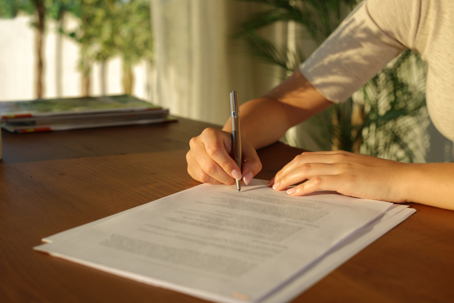Women signing a document
